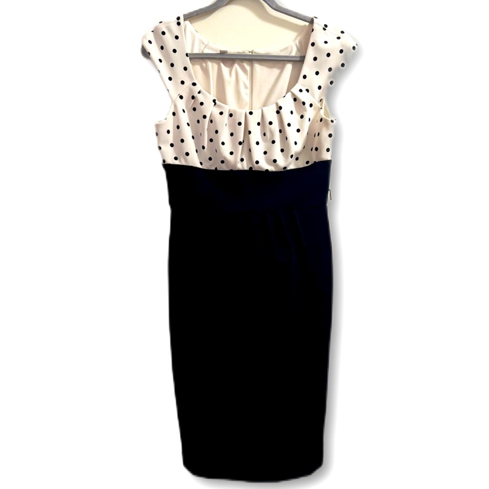 Cute polka dot top midi length dress, worn once, has loops